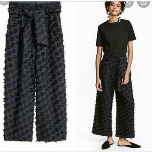 H&M LIMITED EDITION EYELET TROUSERS WITH BELT
